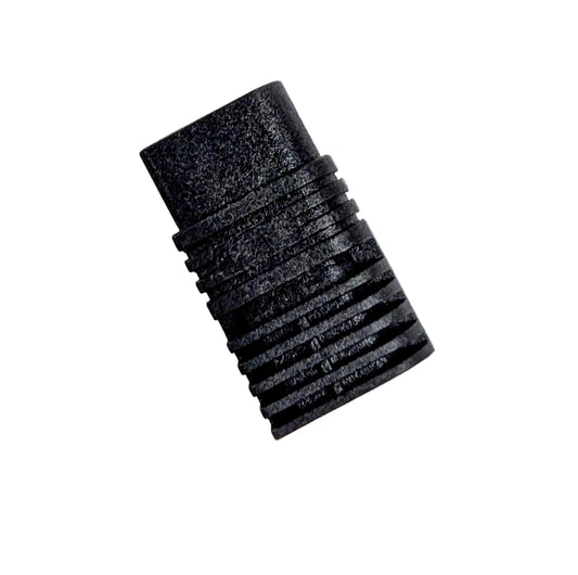 Black rubber grommet on a light gray background