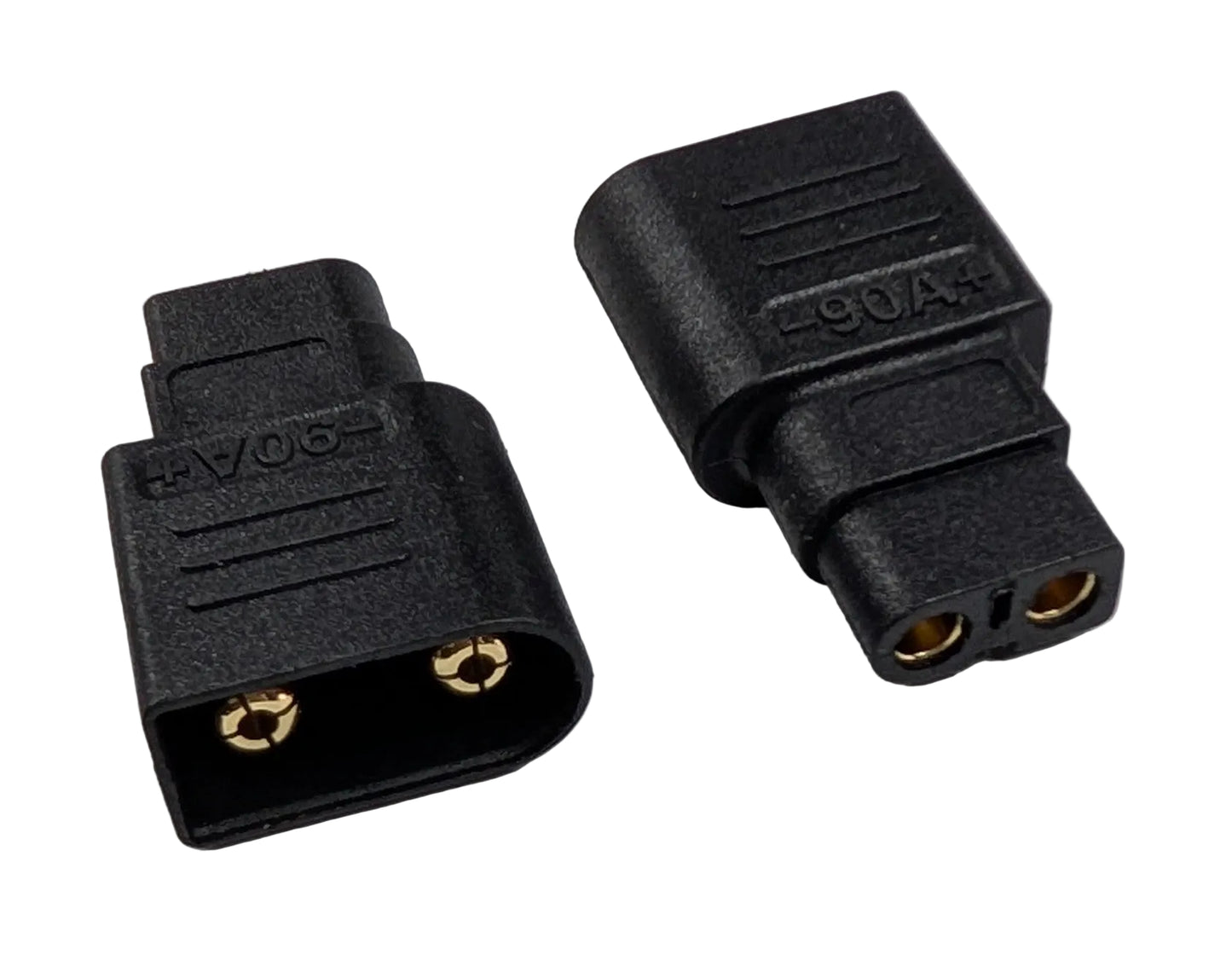 Two black electrical connectors on a gray background